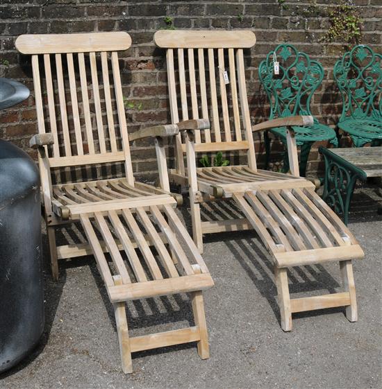2 teak steamer chairs with cushions